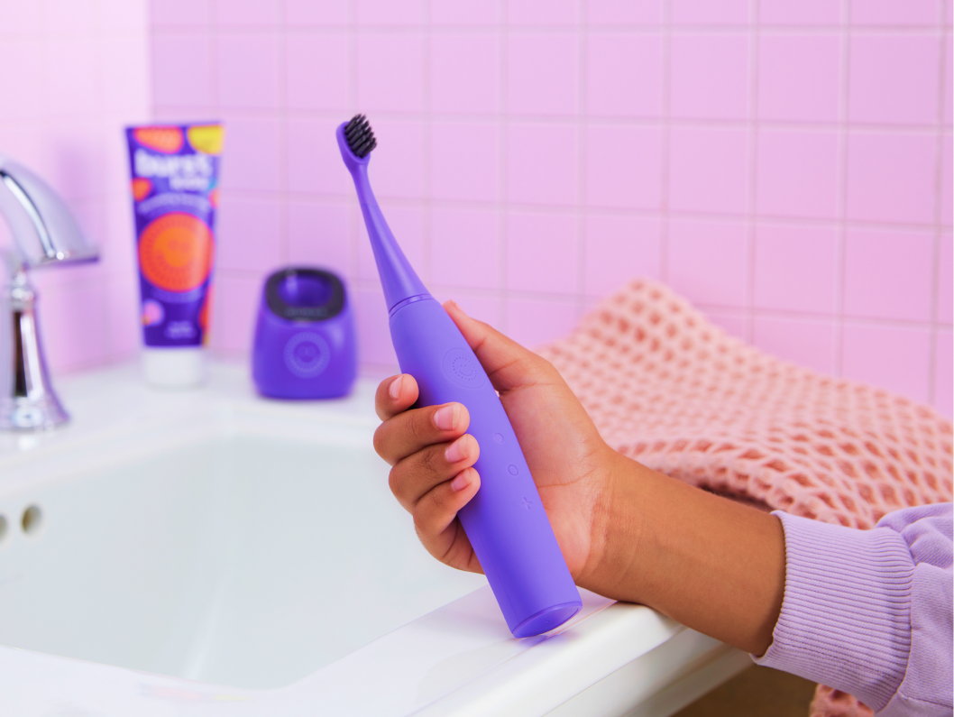 Color: Purple; kids sonic toothbrush